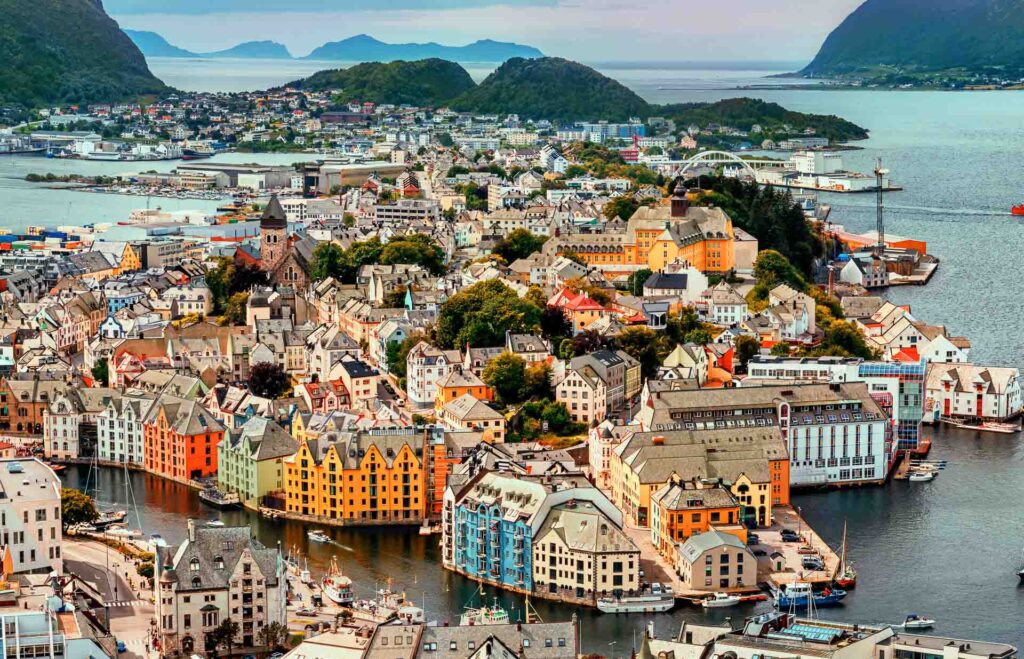 Alesund is a port and tourist city at the entrance to the Geirangerfjord. Cityscape image of Alesund.