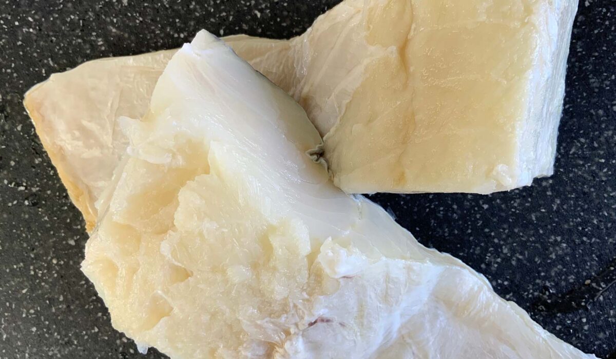 Two portions of cod fish ready for cooking after being rehydrated and desalted