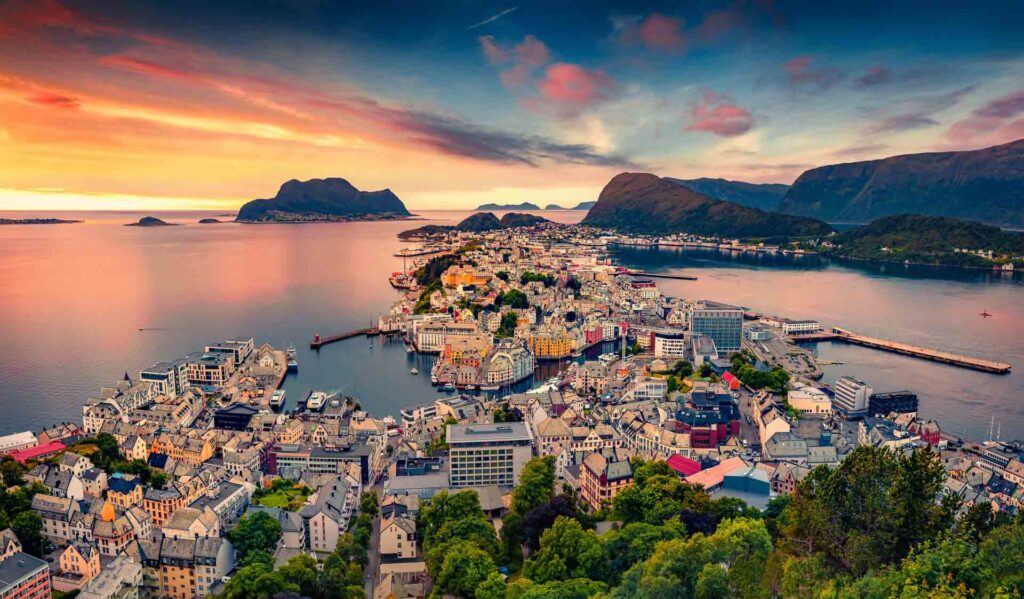 Picturesque summer view from flying drone of Alesund port. Great sunset in west coast of Norway, at the entrance to the Geirangerfjord. Traveling concept background.