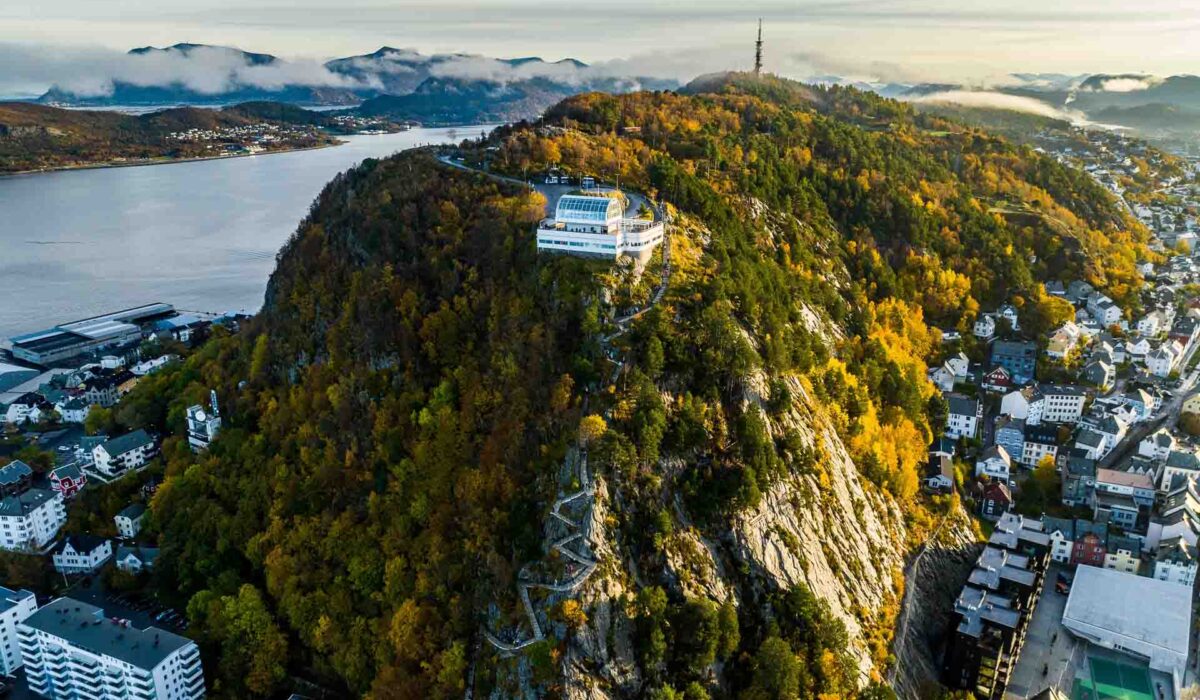 Cultural Experiences in the Western Fjords 14 aerial view over hill Aksla Viewpoint, Alesund during sunrise with clouds