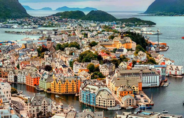 shutterstock_1497941627_lwres Alesund is a port and tourist city at the entrance to the Geirangerfjord. Cityscape image of Alesund.